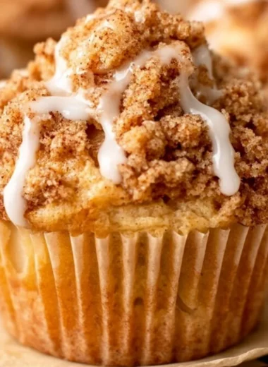 Freshly baked Apple Crumble Muffins with a crunchy topping