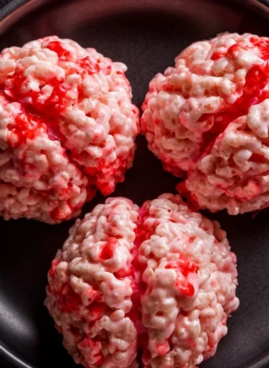 Colorful Halloween Rice Krispies Treats shaped like spooky characters.