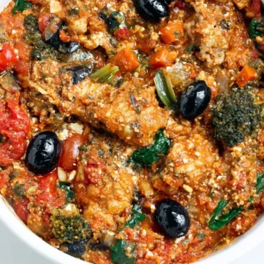 Plate of Mediterranean Chicken with vegetables and herbs