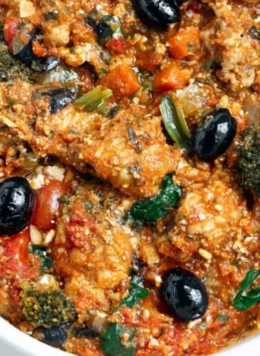 Plate of Mediterranean Chicken with vegetables and herbs