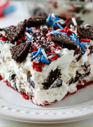 Delicious No Bake Fireworks Oreo Cheesecake Bars with vibrant toppings