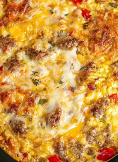 Overnight crockpot breakfast casserole with eggs, cheese, and veggies