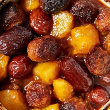 Slow Cooker Meatball Pineapple Smokies in a serving dish