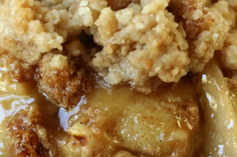 Delicious Apple Pear Walnut Crisp topped with crunchy walnuts and fresh fruit.