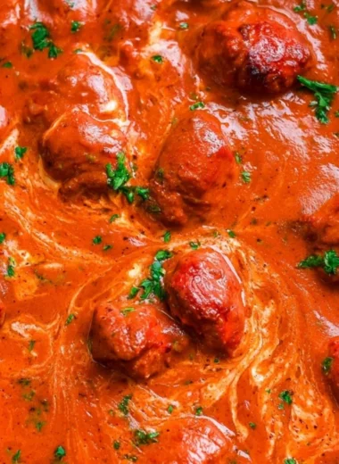 A delicious plate of Chicken Tikka Masala with tender chicken and creamy sauce
