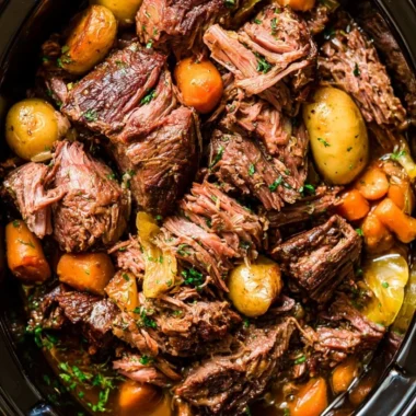 Delicious Crock Pot Chuck Roast cooked to perfection with herbs and spices