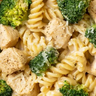 Creamy Chicken Broccoli Pasta dish served in a bowl with garnishes