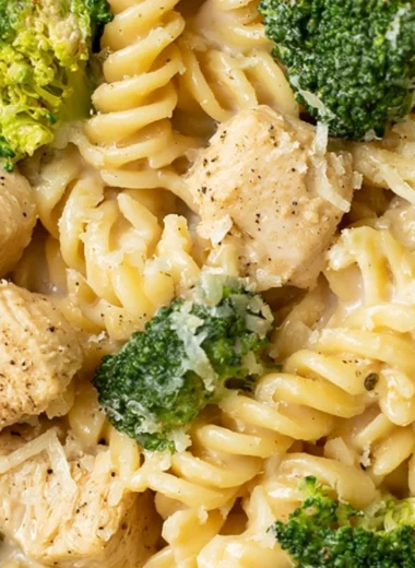 Creamy Chicken Broccoli Pasta dish served in a bowl with garnishes