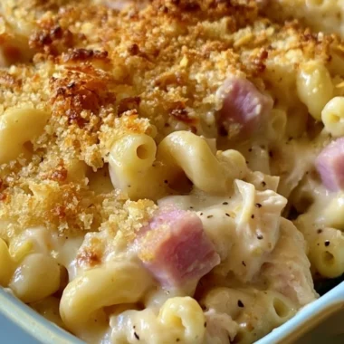 Delicious Chicken Cordon Bleu Casserole topped with melted cheese and herbs