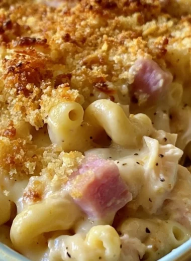 Delicious Chicken Cordon Bleu Casserole topped with melted cheese and herbs