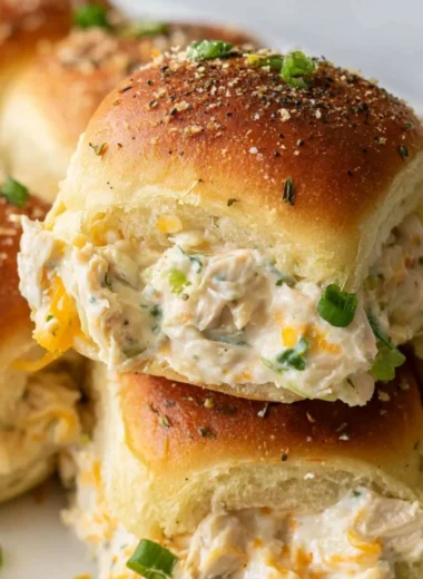 Creamy Crack Chicken Sliders served on a platter with toppings