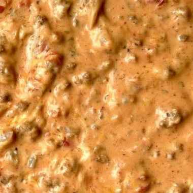 Bowl of delicious and easy queso dip served with tortilla chips