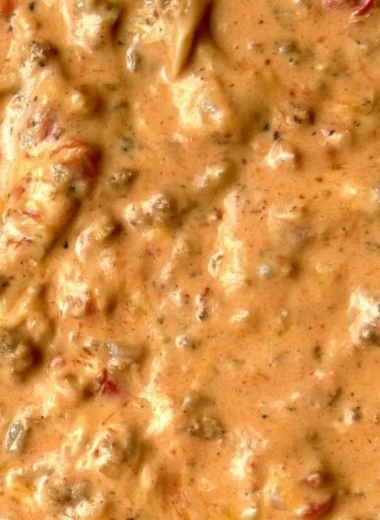Bowl of delicious and easy queso dip served with tortilla chips