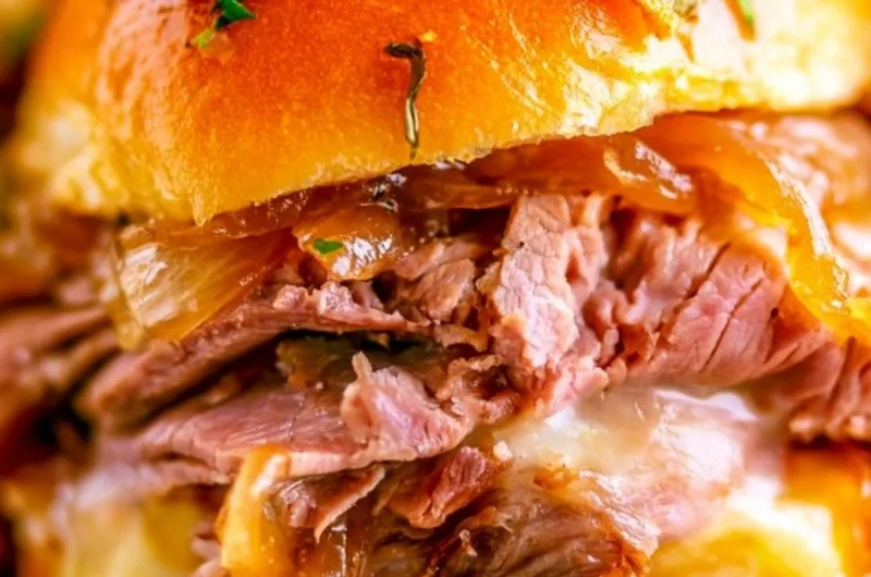 Delicious French Dip Sliders served with dipping sauce