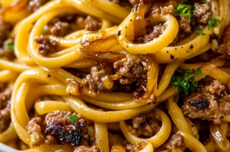Delicious Garlic Butter Beef Pasta garnished with parsley in a bowl