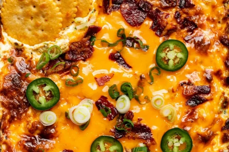 Delicious Jalapeno Popper Dip served in a bowl with a spoon