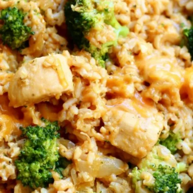One-Pot Chicken and Rice dish garnished with herbs and spices