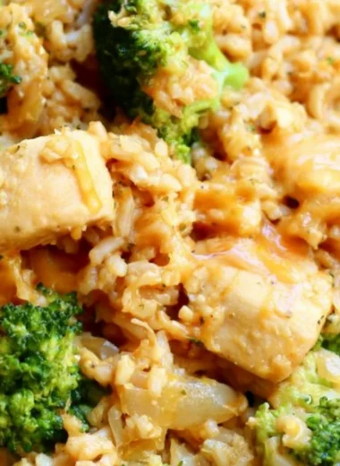 One-Pot Chicken and Rice dish garnished with herbs and spices