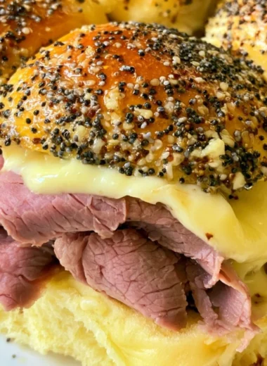 Delicious roast beef sliders on a platter, perfect for parties and gatherings.