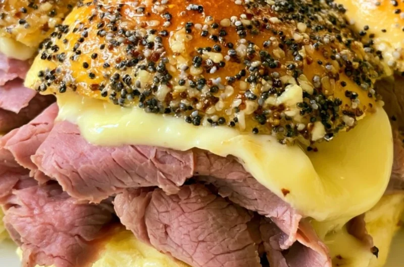 Delicious roast beef sliders on a platter, perfect for parties and gatherings.