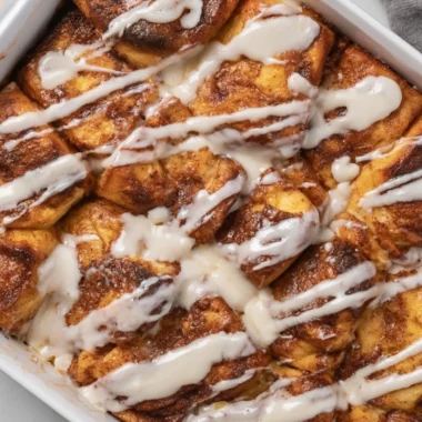 Delicious Easy Cinnamon Roll Casserole served for Christmas breakfast.