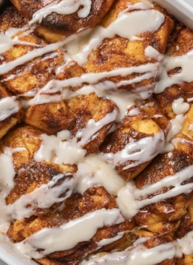 Delicious Easy Cinnamon Roll Casserole served for Christmas breakfast.