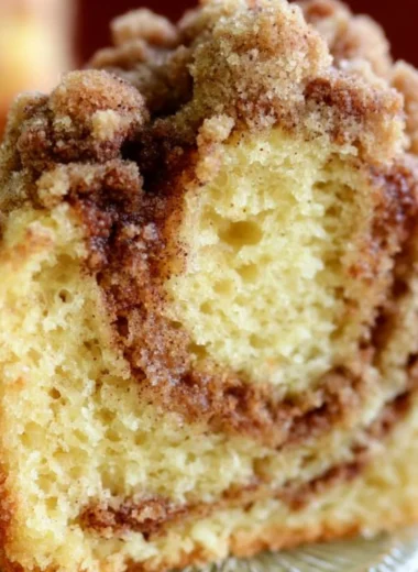 Easy coffee cake made with box cake mix, topped with cinnamon and sugar