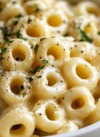 Delicious garlic butter pasta garnished with fresh herbs