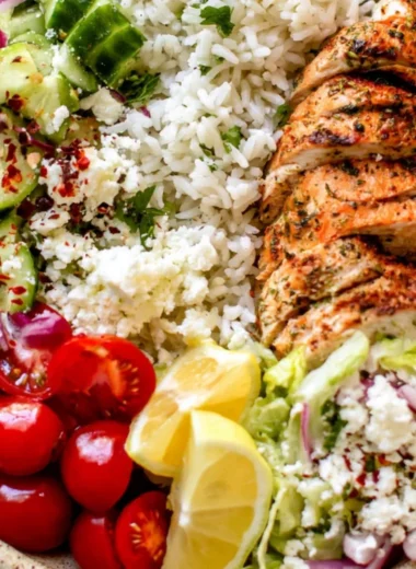 Delicious Greek Chicken Bowl with fresh vegetables and tzatziki sauce
