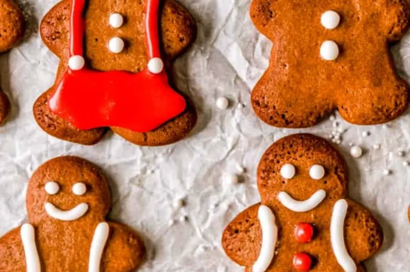 Delicious soft and chewy gingerbread man cookies displayed on a festive plate.