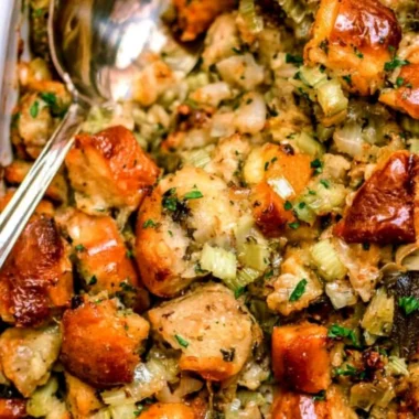 Traditional Thanksgiving stuffing recipe with savory ingredients and herbs.