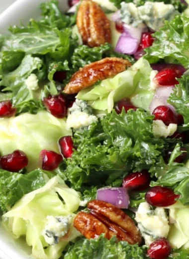 Winter chopped salad with pomegranate, blue cheese, and fresh greens for festive meals